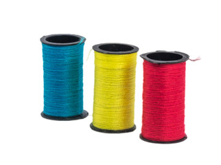 Multi color sewing thread with isolated white background