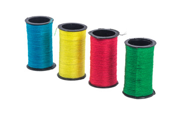 Multi color sewing thread with isolated white background