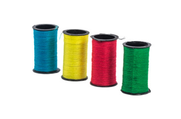 Multi color sewing thread with isolated white background