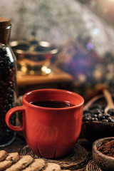 Red Coffee Cup, Coffee Beans And Ground Coffee In Wooden Bowl