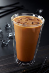 Delicious drink, iced coffee on wooden table