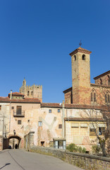 City gate and church tower in Siguenza, Spain