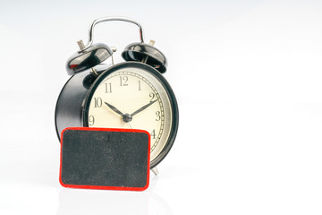 Clock and blackboard with white background.