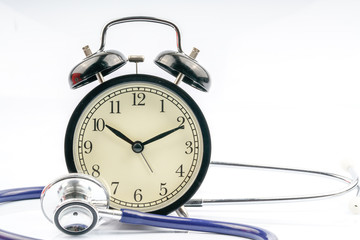 Clock and stethoscope with white background.