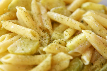 close up of zucchini and cheese pasta