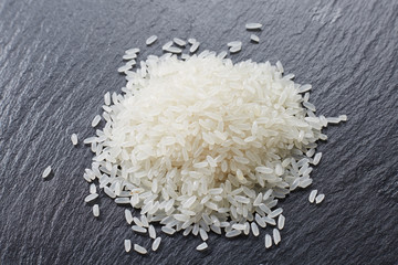 Closeup rice on stone background
