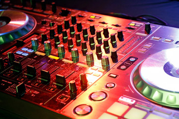 Fototapeta na wymiar DJ control gear, electronic night party