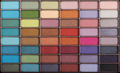 Beauty compact with large assortment of eye shadow