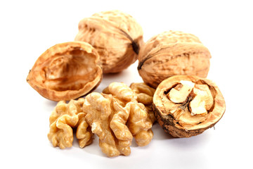 Walnut on white background, isolated. Cracked nut. Dietary product. Omega 3.