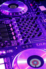 Obraz na płótnie Canvas DJ control gear, electronic night party