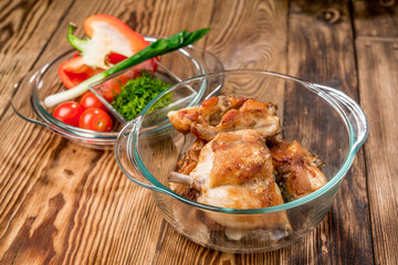 The rabbit baked in an oven in red sauce