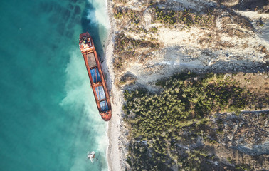 GELENDZHIK, RUSSIA - JAN 19, 2018: The ship called Rio ran aground after a storm in the black sea. Aerial view. - obrazy, fototapety, plakaty