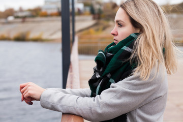 Stressed woman on the beach. Outdoor sad girl