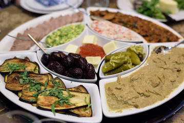 Mix of different snacks and appetizers.  Tapas bar.