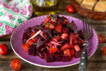 Salad with boiled beetroot, fresh tomato and marinated shallot