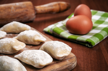 raw delicious ukrainian varenyky and eggs