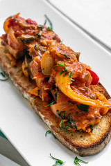 caldeirada de peixe spicy tomato fish stew on toast tapas