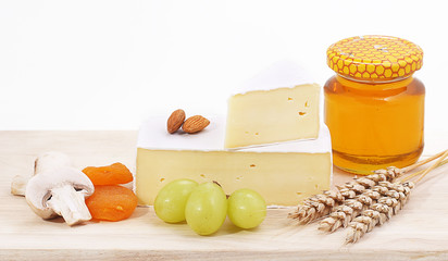 Dor blu with grape and honey on the white background