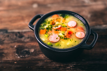 Stew with fresh vegetables and sausages