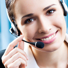 Happy smiling support phone operator at office