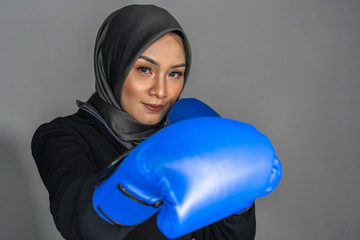 Muslimah fighter with low light view.