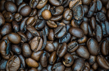 Coffee beans in a pack close-up.