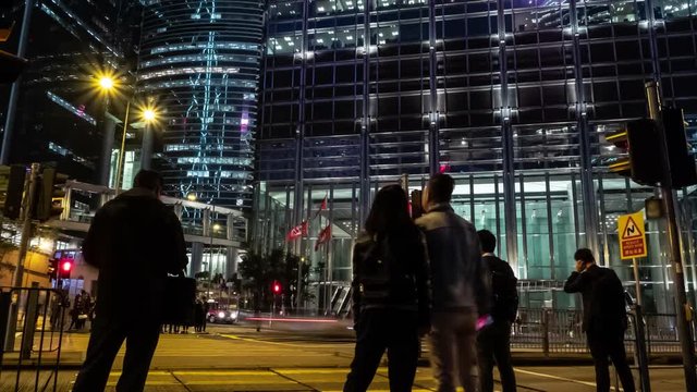 Timelapse of people at a crossing on the road at Hong Kong. Motion time lapse shot.