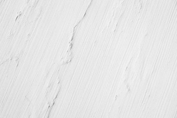 The wall is made of brick and then painted in white. This wall is popular in English style. Also known as a vintage style. as background with copy space.