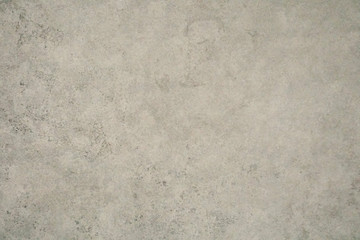 Fototapeta na wymiar Monochrome beige texture with shade of color