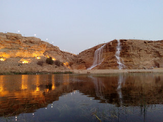 lake with waterfall