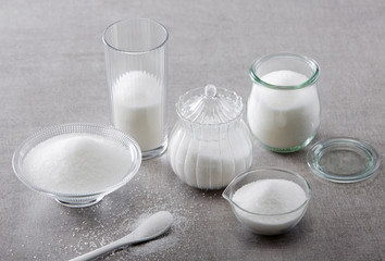 Closeup of sugar in class bottles