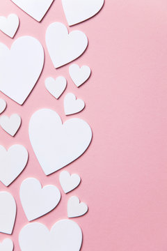 White hearts on a pastel pink background. Valentine's day, Mother's day background