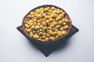 Roasted Phool Makhana or Crispy Lotus pops Seed served in a bowl, selective focus