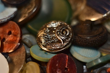 Scattered buttons on the fabric