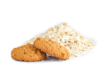 Isolated oatmeal cookies and cereals on a white background