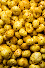 Roasted Phool Makhana or Crispy Lotus pops Seed served in a bowl, selective focus