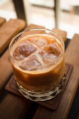  iced coffee on wooden table