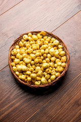 Roasted Phool Makhana or Crispy Lotus pops Seed served in a bowl, selective focus
