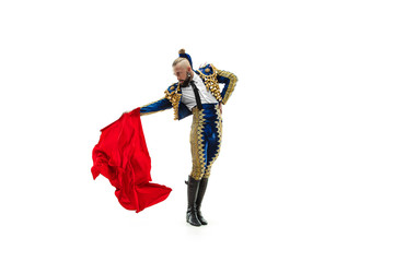 Torero in blue and gold suit or typical spanish bullfighter isolated over white studio background. The taming, achieving the goal, mortification, conquest, boss, leadership, battle, win, winner - obrazy, fototapety, plakaty
