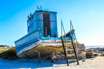 old fishing boat on the beach