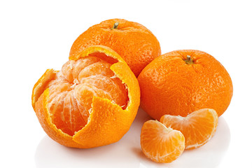 three tangerine on a white background