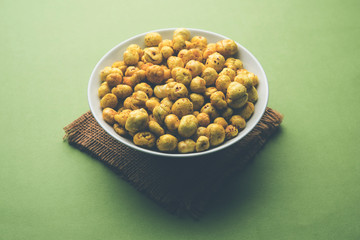 Roasted Phool Makhana or Crispy Lotus pops Seed served in a bowl, selective focus