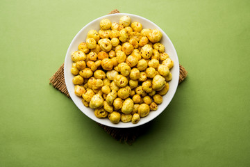 Roasted Phool Makhana or Crispy Lotus pops Seed served in a bowl, selective focus