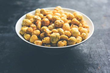 Roasted Phool Makhana or Crispy Lotus pops Seed served in a bowl, selective focus