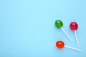 Lollipops on blue background. sweet candy concept