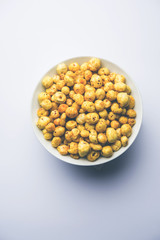 Roasted Phool Makhana or Crispy Lotus pops Seed served in a bowl, selective focus