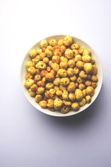 Roasted Phool Makhana or Crispy Lotus pops Seed served in a bowl, selective focus