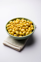 Roasted Phool Makhana or Crispy Lotus pops Seed served in a bowl, selective focus