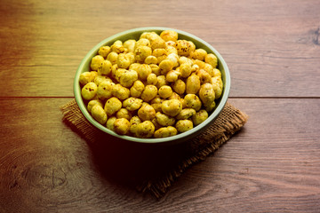 Roasted Phool Makhana or Crispy Lotus pops Seed served in a bowl, selective focus