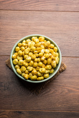 Roasted Phool Makhana or Crispy Lotus pops Seed served in a bowl, selective focus